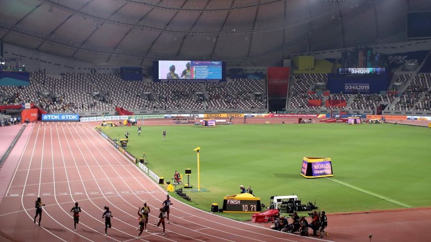 DOHA, QATAR - SEPTEMBER 29: Shelly-Ann Fraser-Pryce of Jamaica, gold,  Dina Asher-Smith of Great Britain, silver, and Marie-Josée Ta Lou of the Ivory Coast, bronze, cross the finish line in the Women's 100 Metres final during day three of 17th IAAF World Athletics Championships Doha 2019 at Khalifa International Stadium on September 29, 2019 in Doha, Qatar. (Photo by Christian Petersen/Getty Images)