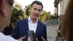 California Gov. Gavin Newsom talks with reporters at the 52nd Annual Native American Day in Sacramento, Calif., Friday, Sept. 27, 2019. (AP Photo/Rich Pedroncelli)