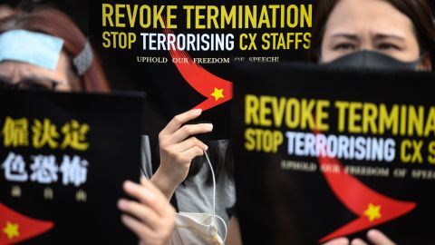 Protesters take part in a rally to support Cathay Pacific staff in Hong Kong after some of the airline's staff were sacked for supporting opposition to a controversal extradition bill.