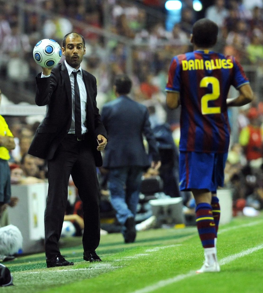 Alves, now playing in Brazil for Sao Paulo, calls Guardiola a 'genius.'