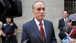 In this September 12, 2019 file photo, U.S. Rep. Chris Collins, R-N.Y., speaks to reporters as he leaves the courthouse after a pretrial hearing in his insider-trading case, in New York.