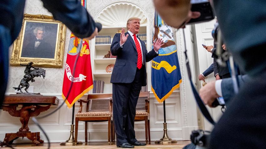 President Donald Trump speaks to member of the media as he departs a ceremonial swearing in ceremony for new Labor Secretary Eugene Scalia in the Oval Office of the White House in Washington, Monday, September 30, 2019.