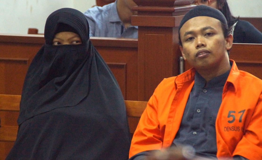 Dian Yulia Novita with her husband Nur Solikin during their trial at East Jakarta District Court in Jakarta, on August 23, 2017. The ex-nanny was sentenced to seven-and-a-half years jail for her involvement in an Islamic State-inspired plot to carry out a suicide bomb attack on the presidential palace in Jakarta.