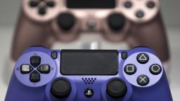 CHIBA, JAPAN - SEPTEMBER 12:  Wireless controller for the PlayStation 4 (PS4) game console are displayed in the Sony Interactive Entertainment Inc. booth on the business day of the Tokyo Game Show 2019 at Makuhari Messe on September 12, 2019 in Chiba, Japan. The Tokyo Game Show will be open to the public on September 14 and 15, 2019. (Photo by Tomohiro Ohsumi/Getty Images)