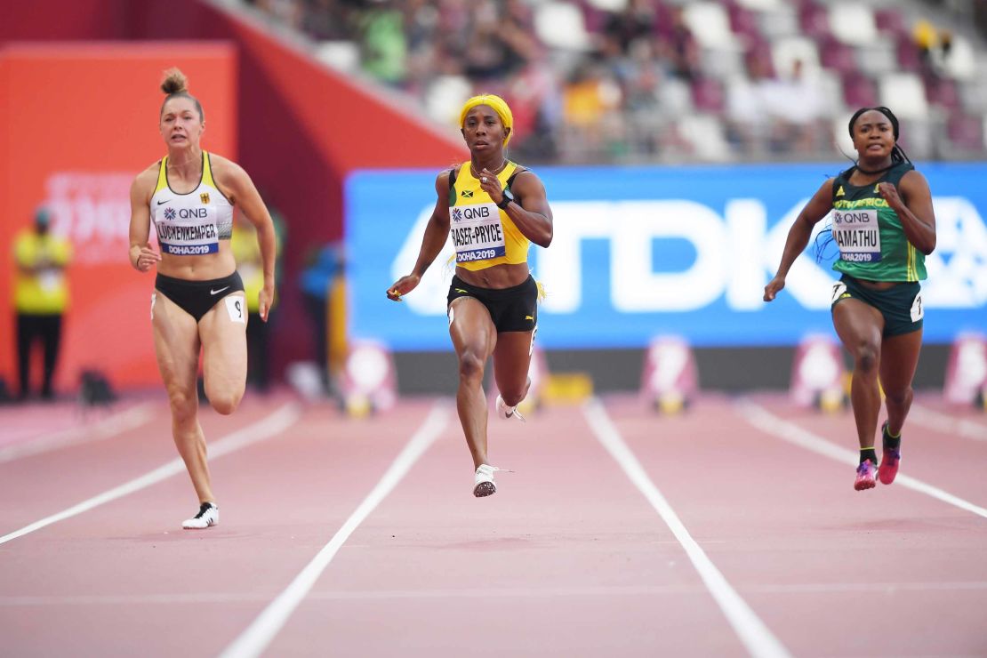 Gina Lückenkemper (left) competes in the women's 100 meters heats at the Khalifa International Stadium in Doha, Qatar on September 28, 2019.