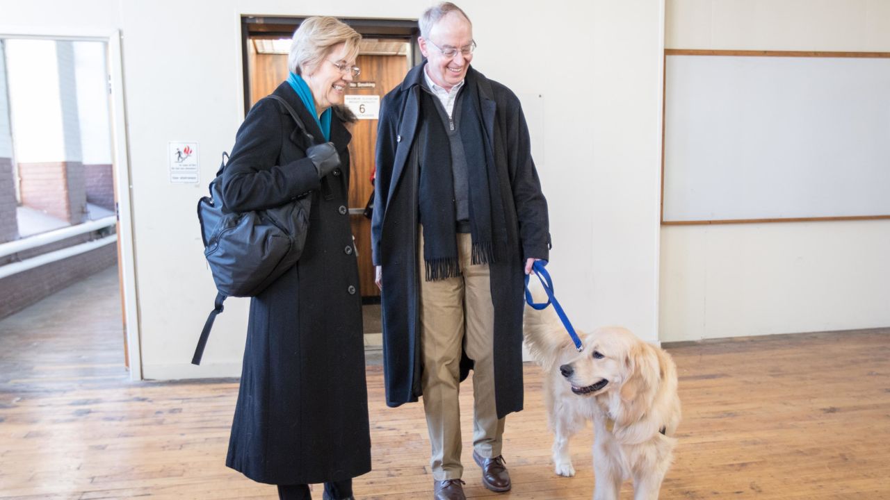 Sen. Elizabeth Warren, husband Bruce Mann and dog Bailey.