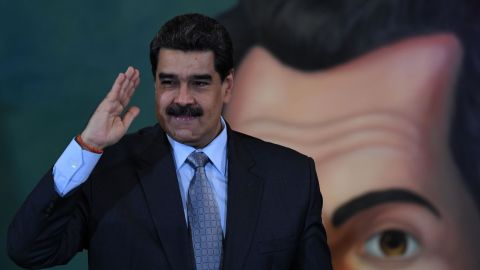 Venezuelan President Nicolas Maduro salutes after a press conference in Caracas on September 30, 2019. 