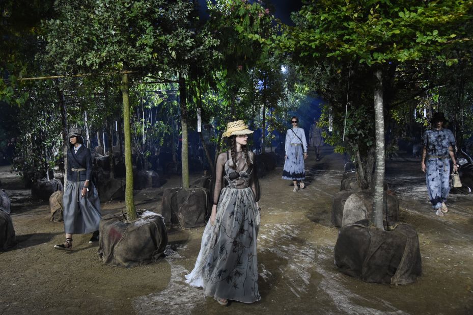 For this season, to spruce up the runway show, Maria Grazia Chiuri used 164 trees that will be replanted after Paris Fashion Week comes to an end.