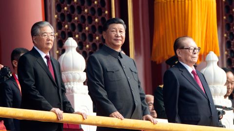 Chinese President Xi Jinping, center, with former presidents Jiang Zemin, right, and Hu Jintao, left, attend the celebration in Beijing.