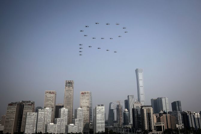 Planes from the Chinese People's Liberation Army air force fly in formation as part of the 70th anniversary celebration in Beijing.