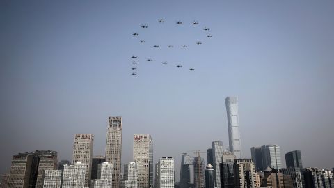 Planes from the Chinese People's Liberation Army air force fly in formation as part of the 70th anniversary celebration in Beijing.
