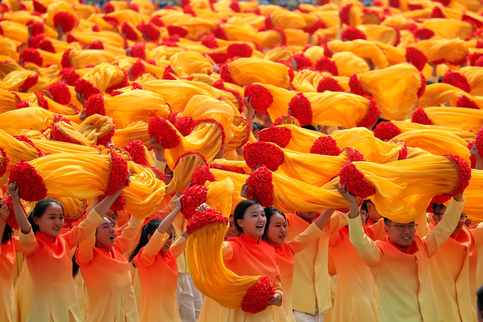 Participants march during the celebration to commemorate the 70th anniversary of the founding of People's Republic of China in Beijing.