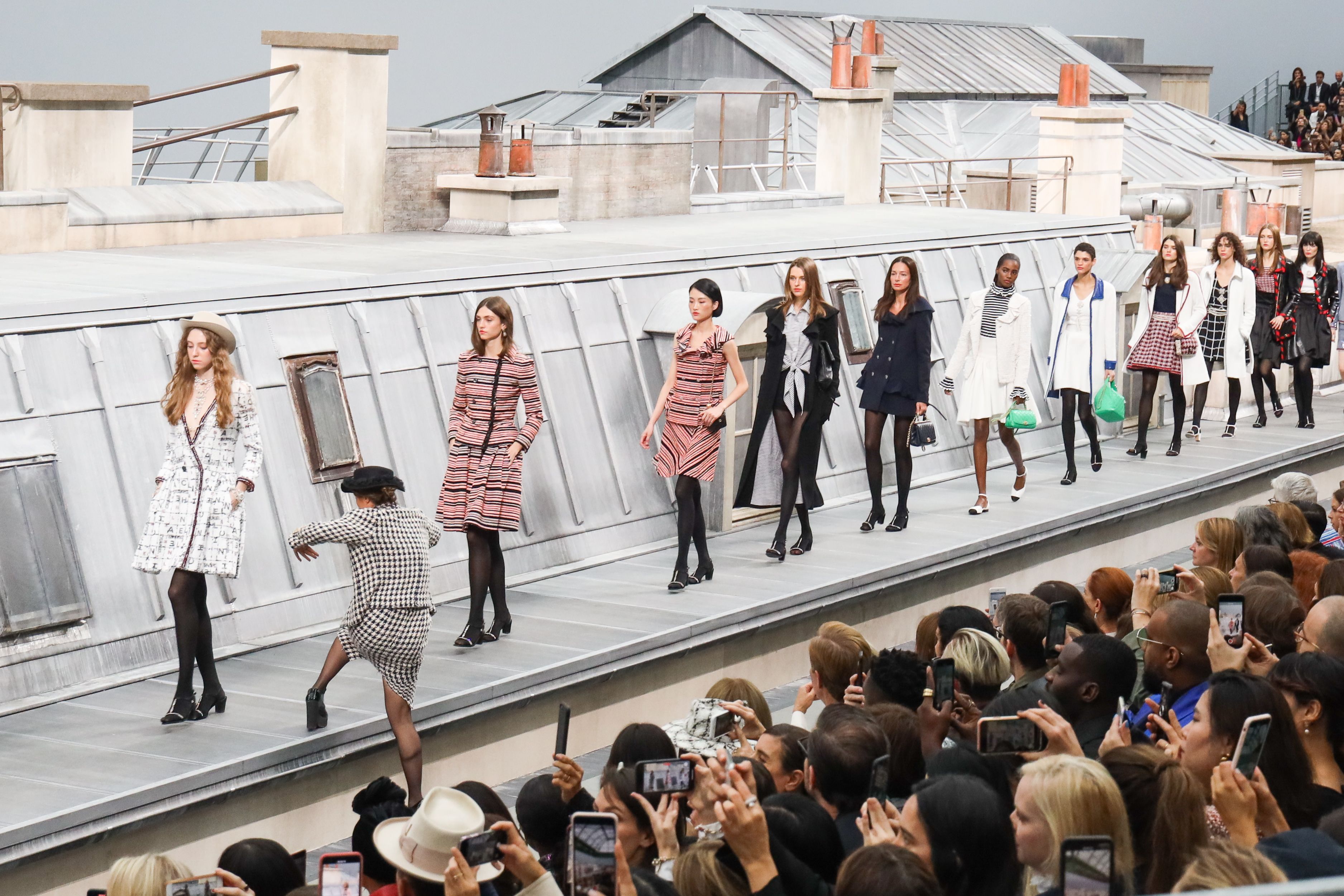 Gigi Hadid saves Chanel show as comedian crashes the runway