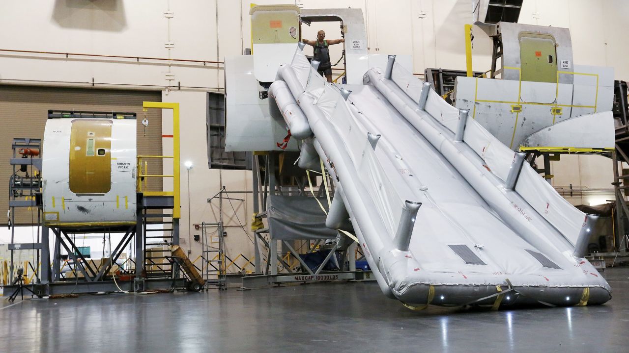 An evacuation slide for the A380 Airbus is tested at UTC Aerospace Systems in Phoenix, Arizona, July 11, 2014. 