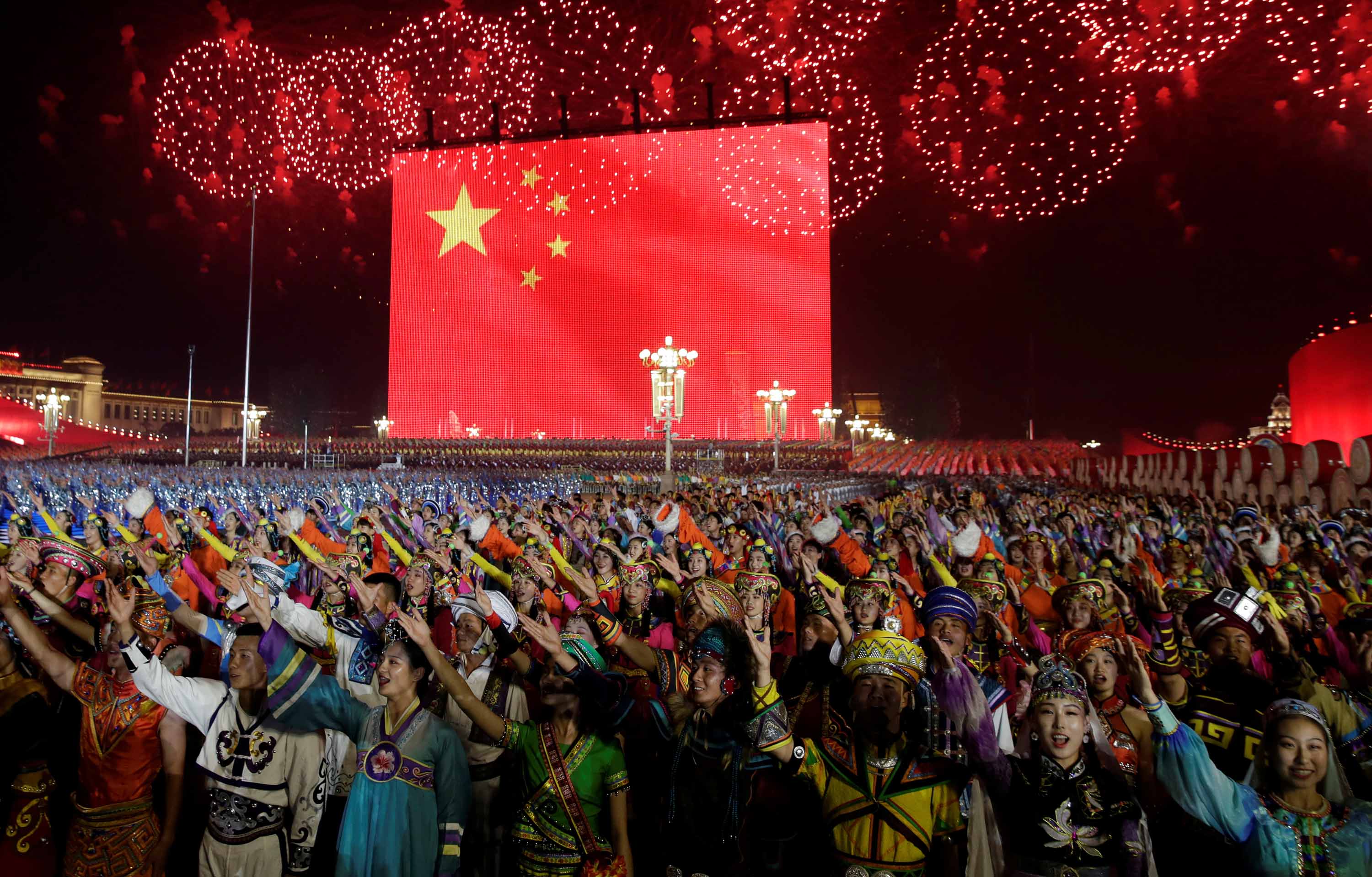 Fireworks explode over Tiananmen Square as performers take part in the evening gala marking National Day, the 70th anniversary of the founding of People's Republic of China, in Beijing, China, on  Tuesday, October 1.