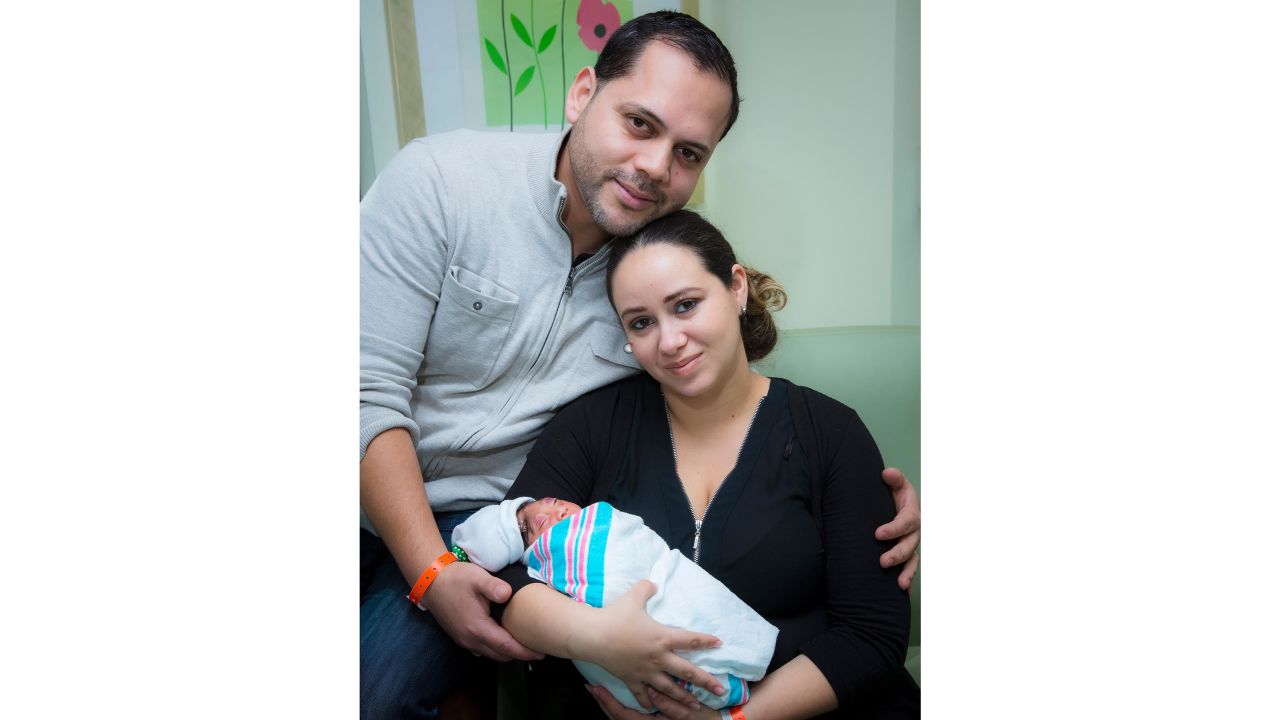 Lucas, seen here with parents Augusto and Maria Santa Maria, is developing much like other children his age, Dr. Tim Vogel said.