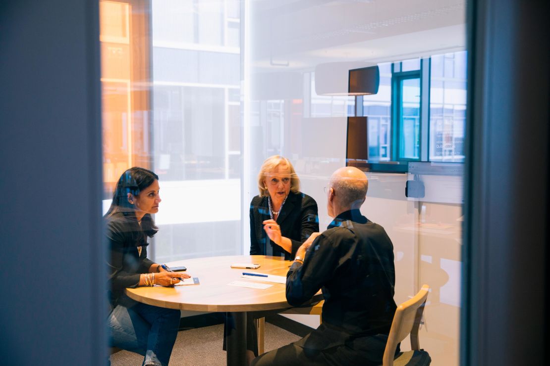 Whitman and Katzenberg meet with a colleague at Quibi's headquarters. They say their new streaming service aims to appeal to users during their "in-between moments," whether that be waiting at a doctor's office or standing in line for coffee.
