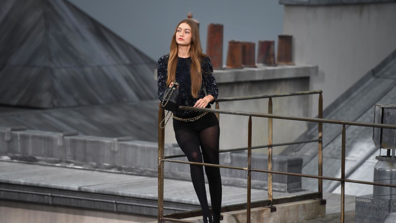 US - Palestinian model Gigi Hadid presents a creation by Chanel during the Women's Spring-Summer 2020 Ready-to-Wear collection fashion show at the Grand Palais in Paris, on October 1, 2019. (Photo by Christophe ARCHAMBAULT / AFP)        (Photo credit should read CHRISTOPHE ARCHAMBAULT/AFP/Getty Images)