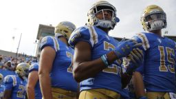 PASADENA, CALIFORNIA - NOVEMBER 17:  Wide receiver Antonio Brown #25 of the UCLA Bruins  waits with teammates to take the field during the first half of a football game at Rose Bowl on November 17, 2018 in Pasadena, California. (Photo by Katharine Lotze/Getty Images)