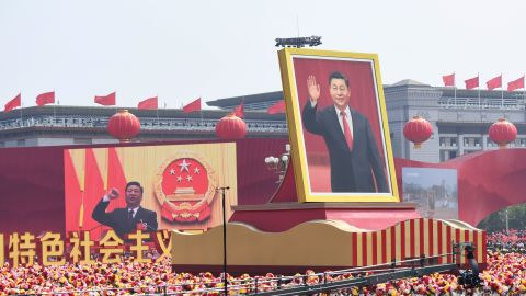 A giant portrait of Chinese leader Xi Jinping is paraded in Beijing during a military parade marking the 70th anniversary of the country's founding.