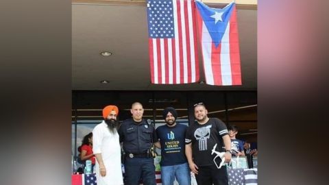 Deputy Sandeep Dhaliwal with a group of volunteers in Puerto Rico after Hurricane Maria.