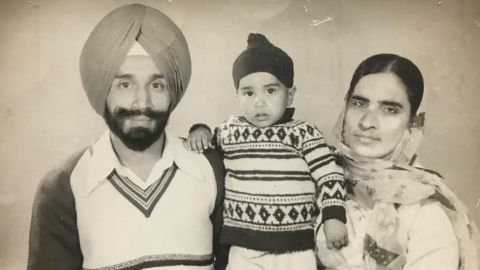 Sandeep Dhaliwal as a young child with his parents.