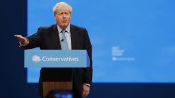 Britain's Prime Minister Boris Johnson gestures as he arrives to deliver his Leader's speech at the Conservative Party Conference in Manchester, England, Wednesday, Oct. 2, 2019. Britain's ruling Conservative Party is holding their annual party conference. (AP Photo/Frank Augstein)