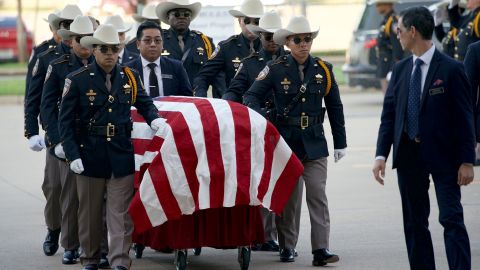 An honor guard escorts Dhaliwal's casket into his funeral service on Wednesday.