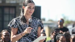 Meghan, Duchess of Sussex gives a speech during a visit to the "Justice desk", an NGO in the township of Nyanga in Cape Town, as they begin their tour of the region on September 23, 2019. - Britain's Prince Harry and his wife Meghan arrived in South Africa on September 23, launching their first official family visit in the coastal city of Cape Town. The 10-day trip began with an education workshop in Nyanga, a township crippled by gang violence and crime that sits on the outskirts of the city. (Photo by Betram MALGAS / various sources / AFP)        (Photo credit should read BETRAM MALGAS/AFP/Getty Images)