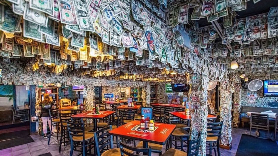Dollar bills hang everywhere at the Siesta Key Oyster Bar.
