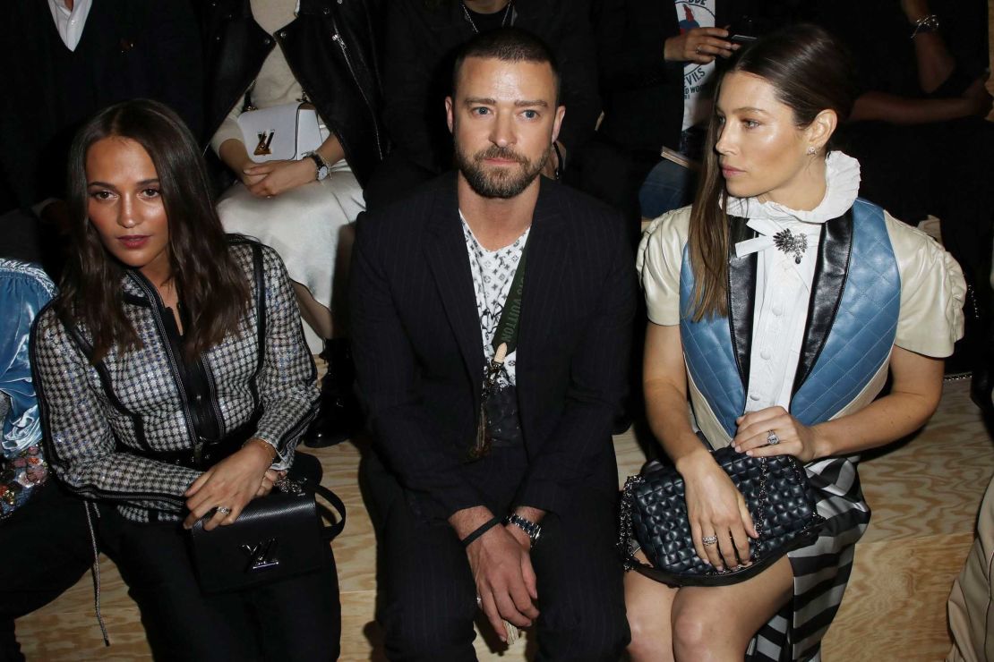 Justin Timberlake was grabbed by a prankster at Paris Fashion Week