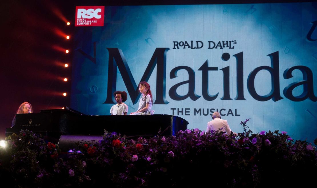 Tim Minchin and the cast of the RSC's hit musical 'Matilda' on stage at the BBC Proms in London's Hyde Park on September 10, 2016.