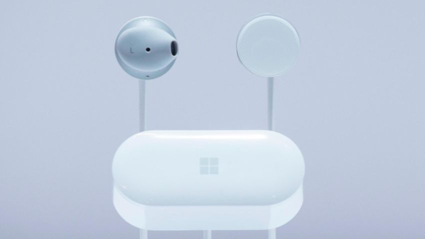 Microsoft Surface Earbuds and a case are displayed, Wednesday, Oct. 2, 2019, in New York. (AP Photo/Mark Lennihan)