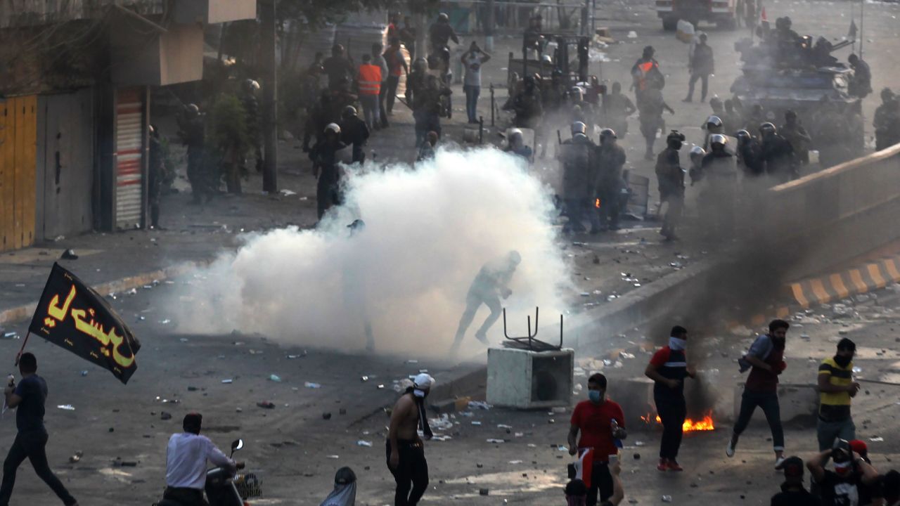 Iraqi police fire teargas at protesters during a demonstration against state corruption, failing public services and unemployment at Tayaran square in Baghdad on October 2, 2019. - Iraq's president and the United Nations urged security forces to show restraint after two protesters were killed in clashes with police that other top officials blamed on "infiltrators." (Photo by AHMAD AL-RUBAYE / AFP) (Photo by AHMAD AL-RUBAYE/AFP via Getty Images)