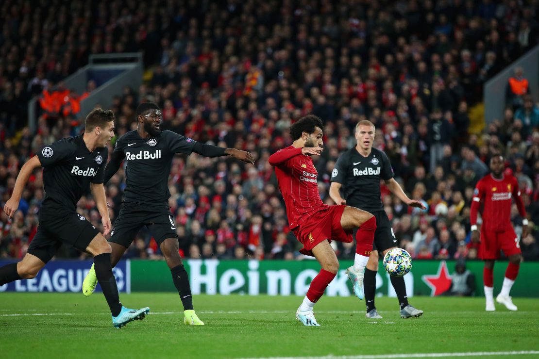 Mohamed Salah scores his side's fourth to secure victory.