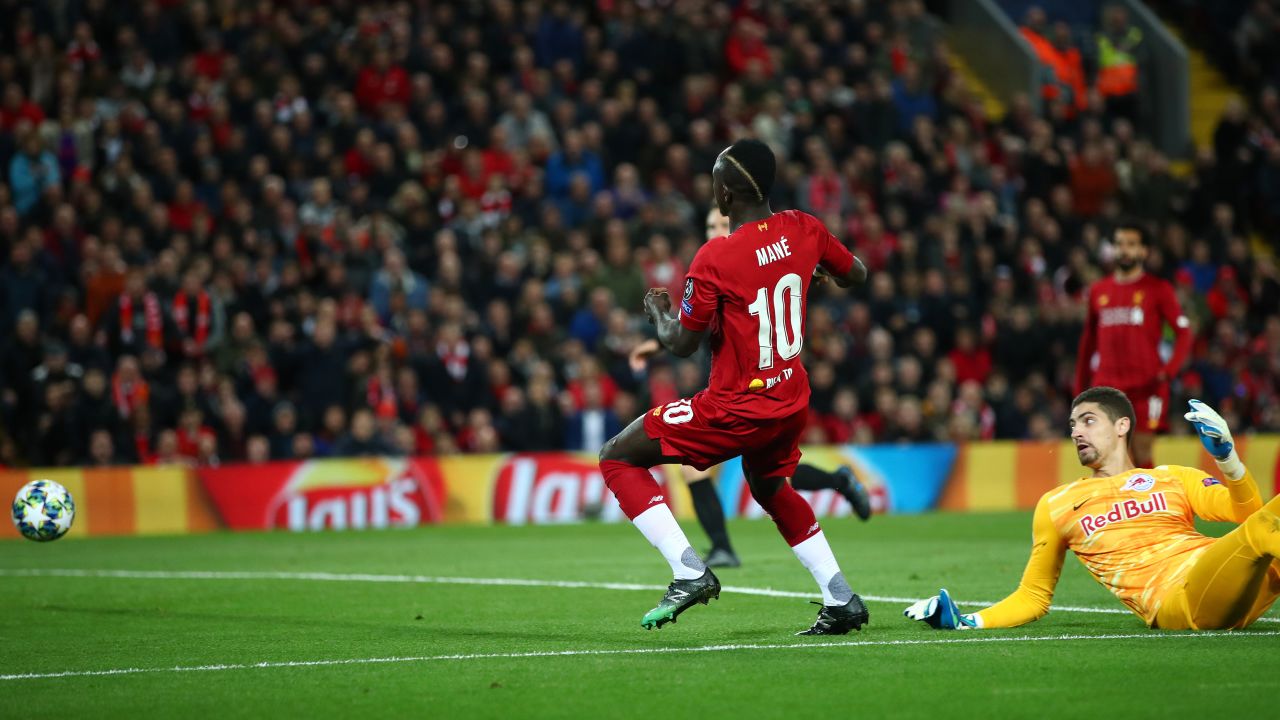 Sadio Mane of Liverpool opens the scoring at Anfield.