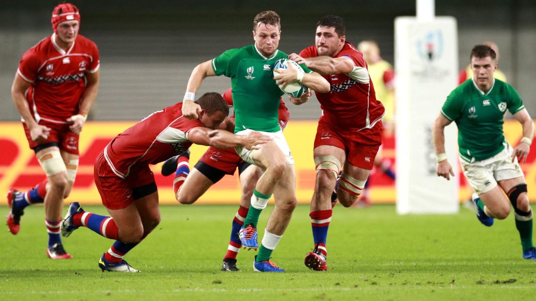 Jack Carty of Ireland tries to break clear as his side looks to bounce back against Russia in Kobe following a shock defeat by host Japan.