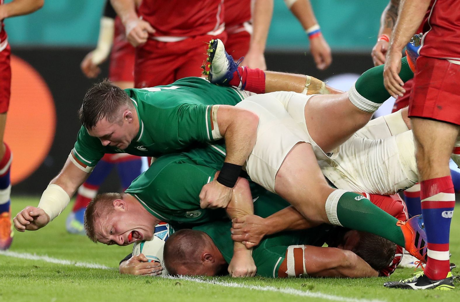 Ruddock scores Ireland's third try as the world's No.1 ranked team runs out the 35-0 winner to get back on track in the tournament.