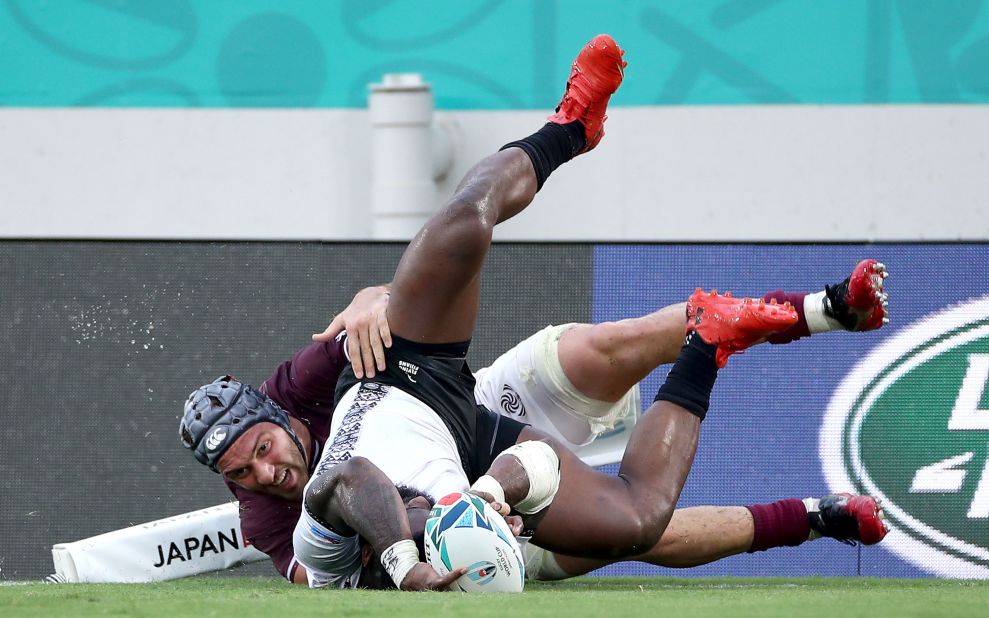 Semi Radradra scores his team's seventh try as Fiji triumphs 45-10 against Georgia.