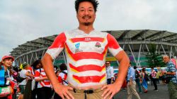 A Japan fan has the national team's jersey painted on as he arrives for the Japan 2019 Rugby World Cup Pool A match between Japan and Ireland at the Shizuoka Stadium Ecopa in Shizuoka on September 28, 2019. (Photo by William WEST / AFP)        (Photo credit should read WILLIAM WEST/AFP/Getty Images)