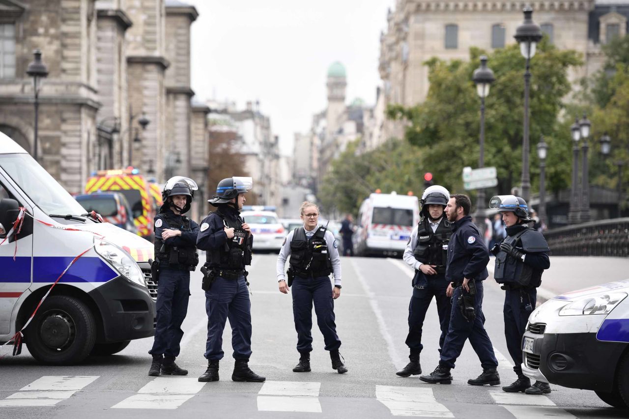 Police block a street after <a href="https://www.cnn.com/2019/10/03/europe/paris-police-attack-intl/index.html" target="_blank">a knife attack</a> at Paris' police headquarters on Thursday, October 3. Three police officers and an administrative worker were killed by a fellow member of staff, who was later shot dead, authorities told CNN.