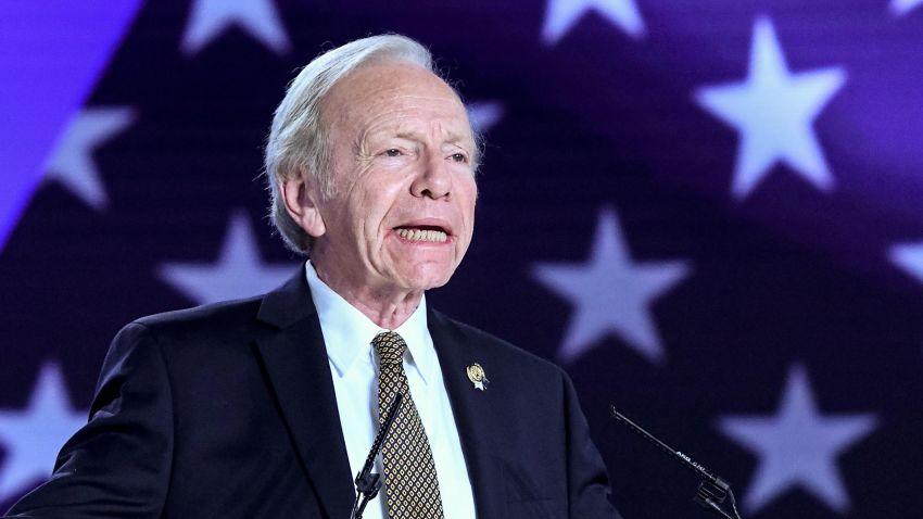 Former US Senator Joe Lieberman gestures as he speaks during a conference in Albanian town of Manza, on July 13, 2019. 