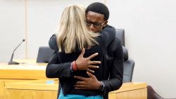 Botham Jean's younger brother Brandt Jean hugs former Dallas police officer Amber Guyger after delivering his impact statement to her following her 10-year prison sentence for murder at the Frank Crowley Courts Building in Dallas, Texas, U.S. October 2, 2019.  Tom Fox/Pool via REUTERS MANDATORY CREDIT     TPX IMAGES OF THE DAY
