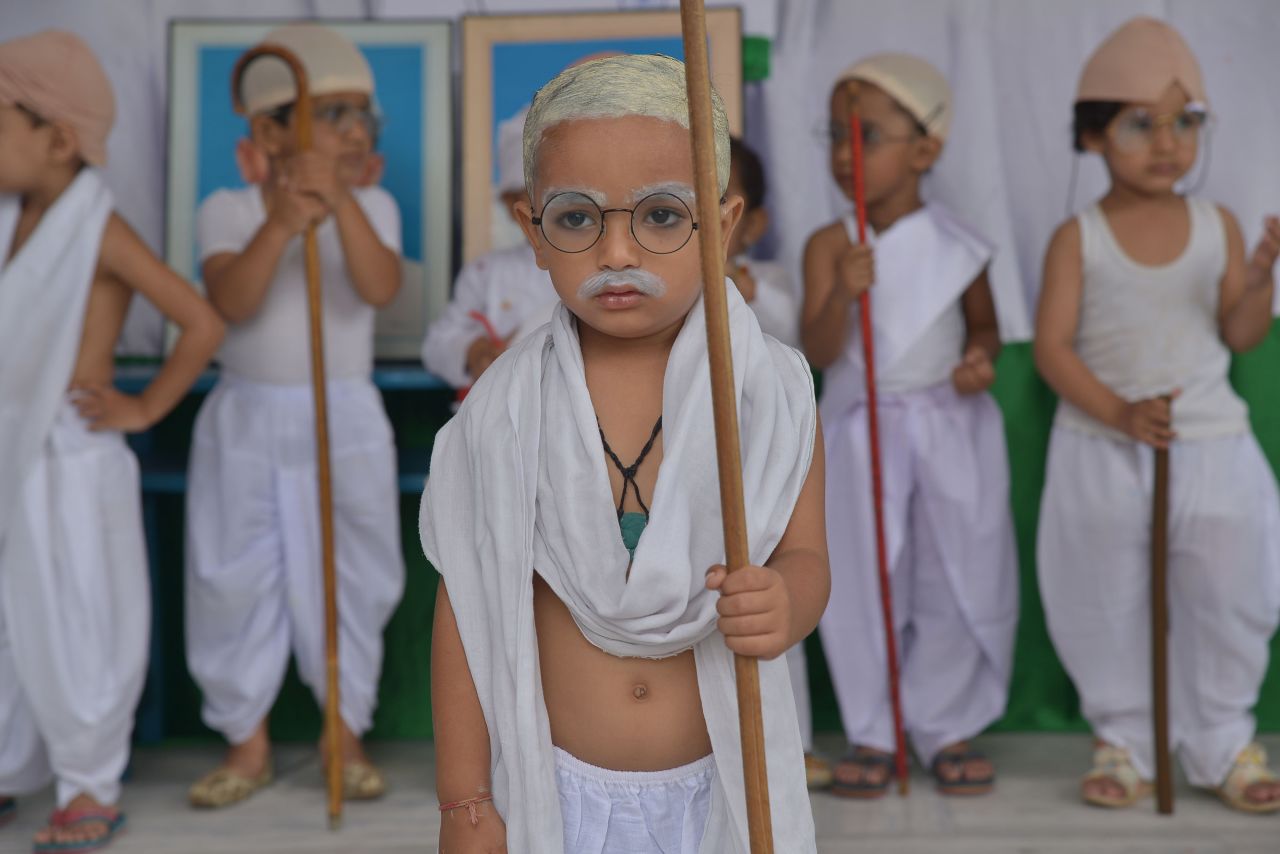 Children in Ajmer, India, dress up as Mahatma Gandhi on <a href="https://www.cnn.com/2019/10/02/world/gandhi-150-year-birthday-anniversary-trnd/index.html" target="_blank">the late leader's birthday</a> on Tuesday, October 1.