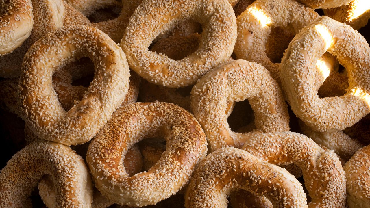 <strong>Montreal bagels, Canada. </strong>Smaller than their New York counterparts, these bagels are made with dough mixed with egg and honey, and the hand-shaped rings are boiled in honey water before baking.