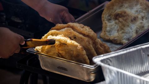 <strong>Fry bread, Navajo Nation.</strong> Now a symbol of perseverance and tradition, fry bread was created by the Navajo people using government-provided stores of white flour, lard and sugar.