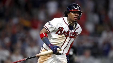 Ronald Acuña Jr. watches his hit for a single against the St. Louis Cardinals during the seventh inning in Game 1 of the National League Division Series on Thursday at SunTrust Park in Atlanta.