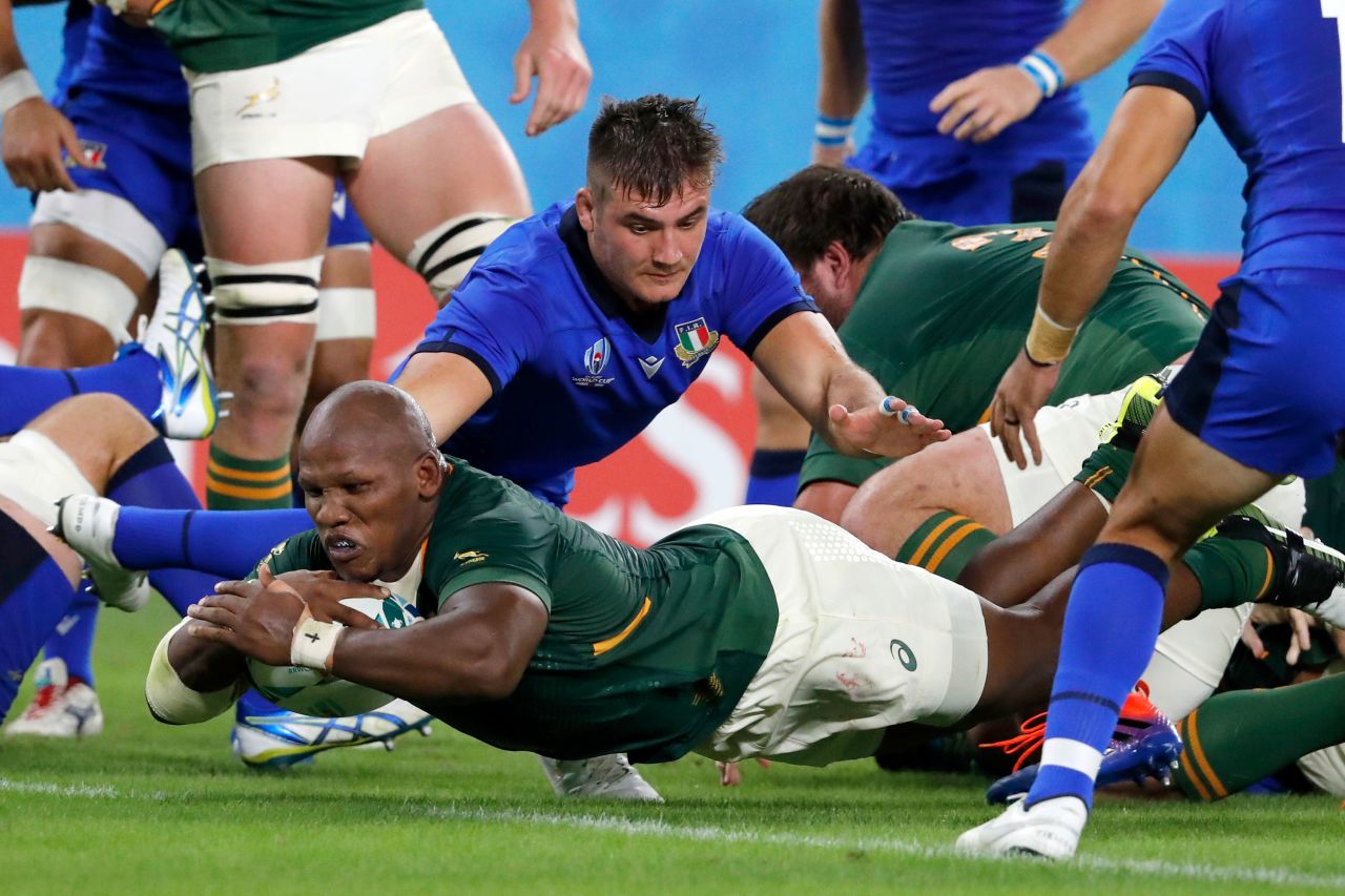South Africa ran out comfortable winners -- 49-3 -- at the game at the Shizuoka Stadium Ecopa in Shizuoka. Mbongeni Mbonambi dives across the line to score a try for South Africa.