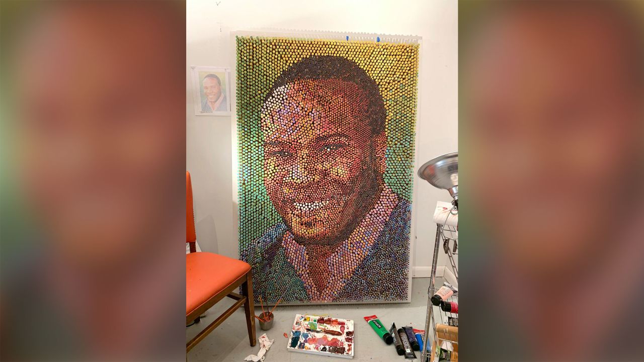 The portrait of Botham Jean is based on his mother's favorite photograph of him.