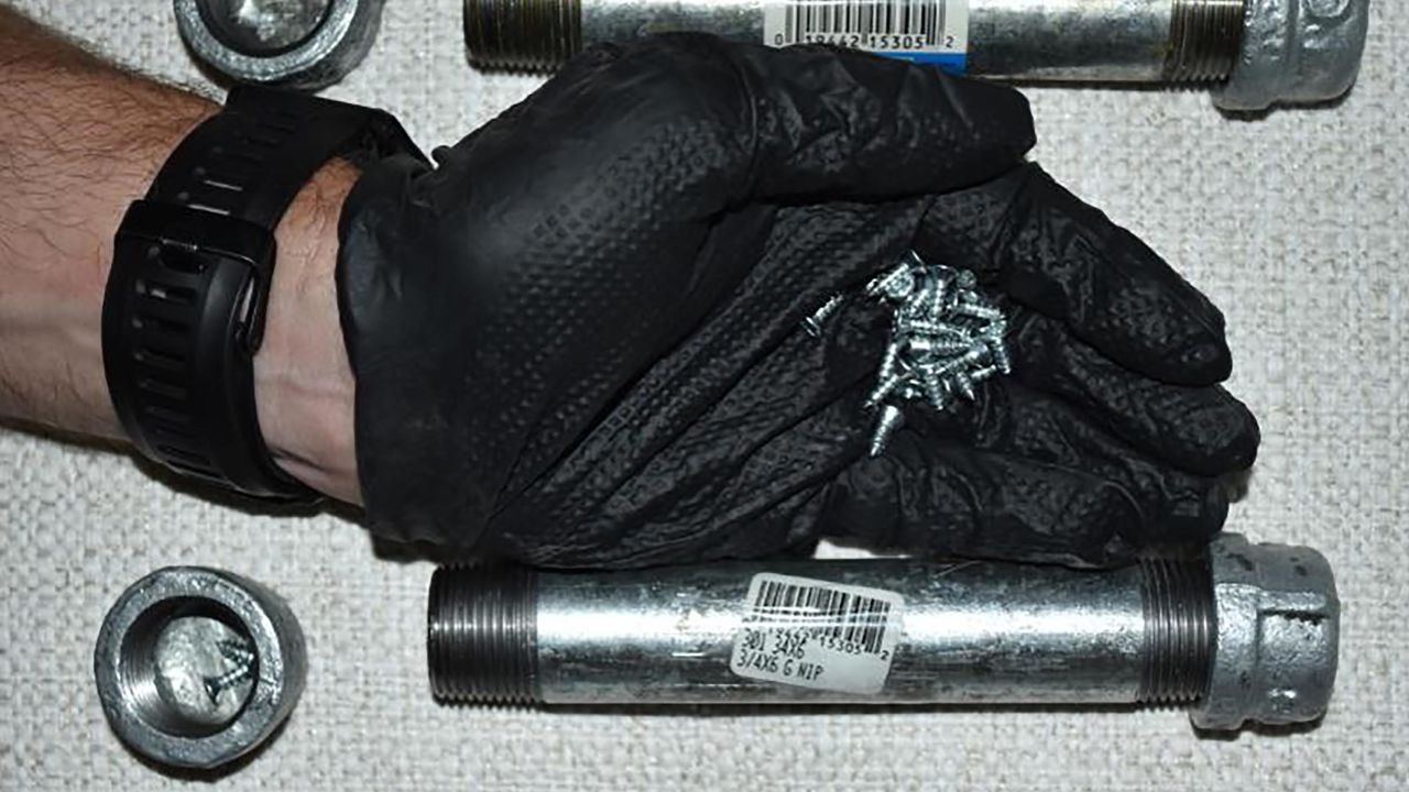 Each pipe bomb, like the one seen here, was filled with nails or metallic pellets, authorities said.